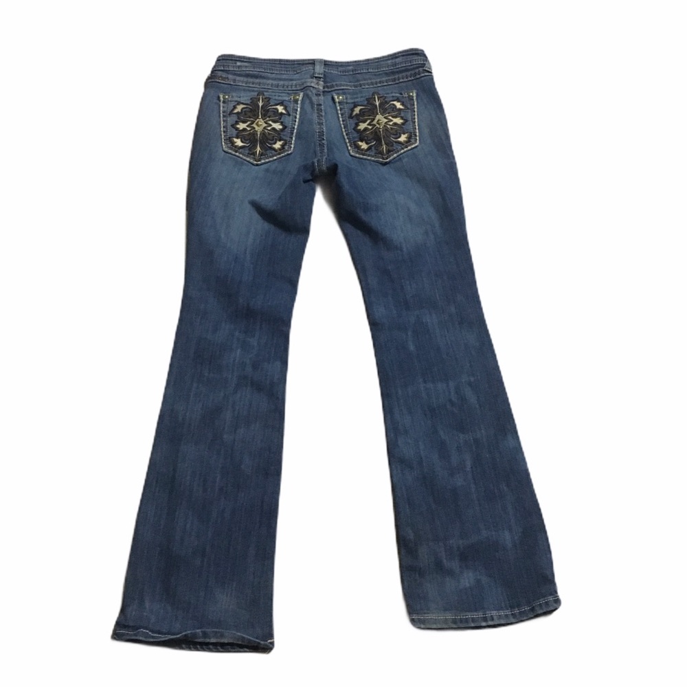 Artiat mid rise boot cut “Turquoise” jeans. Sz 29R